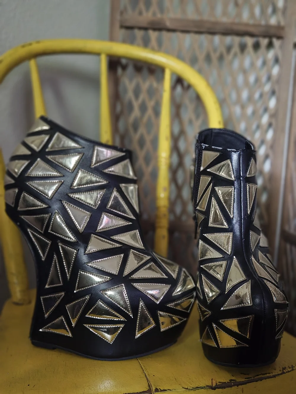 Prestiged Women's Black Ankle Wedge Booties with Gold Geometric Accents